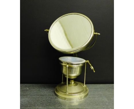An unusual early 20th century pewter Gentleman's shaving mirror and stand, complete with original burner and opaque glass bas