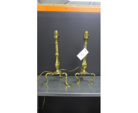 A pair of brass knop stemmed electric table lamp bases, on tripod supports, 30cm high, (2)