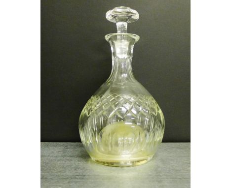 An unusual crystal musical decanter, 28cm high