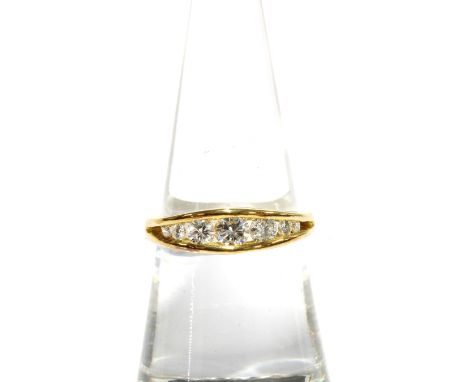 18ct gold diamond ring with a row of seven graduating brilliant cut diamonds, Sheffield 1993 