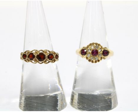 Early 20th century 18ct gold ruby and diamond ring, Sheffield 1925, together with an unmarked garnet yellow metal ring (2) 