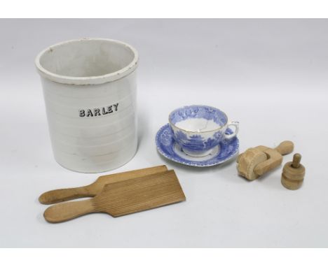 Vintage kitchenalia to include a barley pot, wooden butter pats, a small mould and a Spode blue and white cup and saucer. 