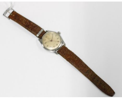 TUDOR OYSTER, Gents vintage shock resisting wristwatch, stainless steel case with signed champagne dial with Arabic numerals,