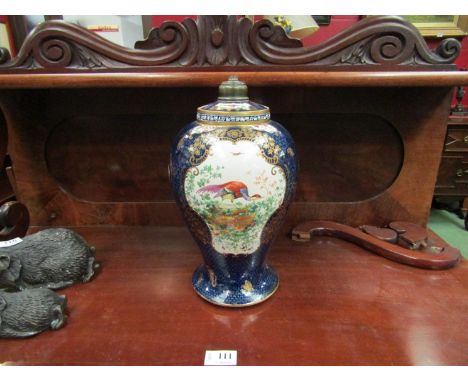 A Booth's ceramic table lamp base, cobalt blue and gilt with motifs of exotic birds, 33cm tall