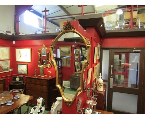 A gilt painted wall bracket and pier mirror en suite with acanthus leaf carved decoration