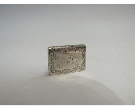 A silver pill/patch box in the form of a book (2cm x 3cm)