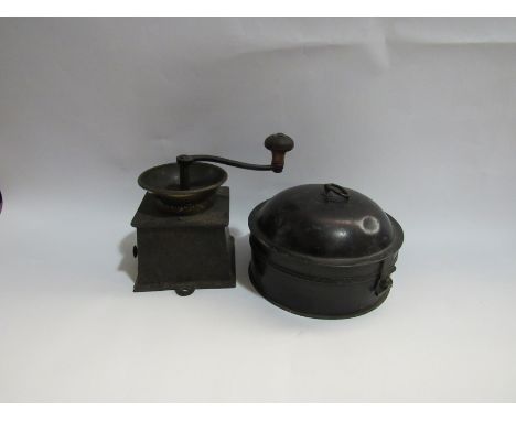 An antique painted metal spice tin and a Kenrick coffee grinder (2)