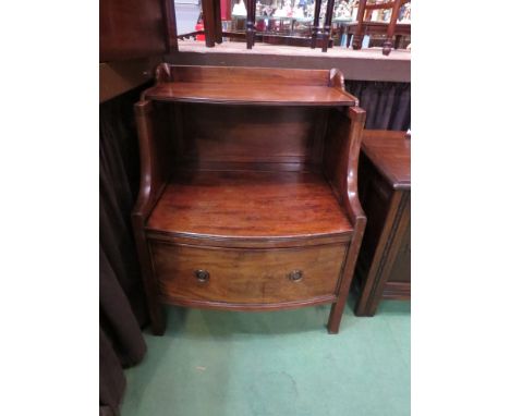 An early 19th Century mahogany bow front nightstand, the open shelf over a single base drawer, 71cm x 56cm x 46cm