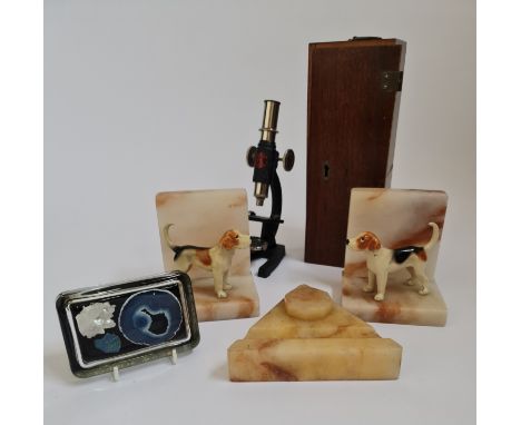 A selection of various items to include microscope in wooden case, onyx inkwell pen rest, onyx bookends with beagles and ston