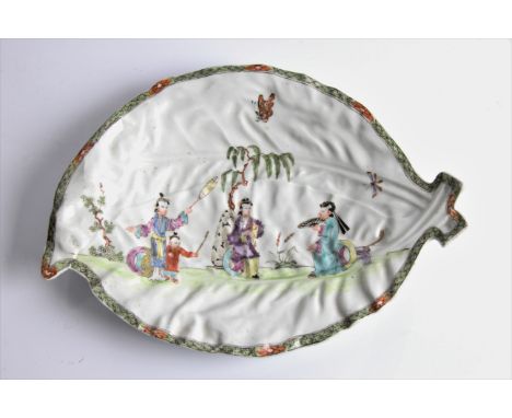 An 18th century Worcester Chinese Musicians pattern leaf form plate, depicting central female playing flute flanked by other 