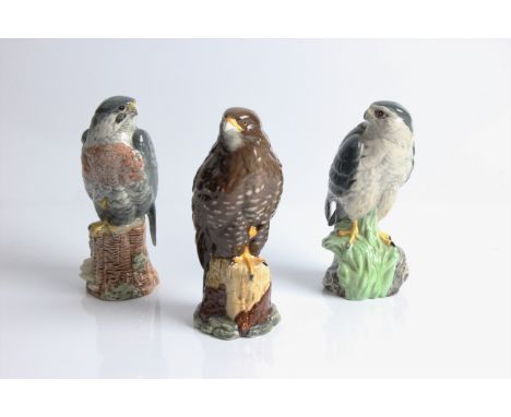 A Royal Doulton Whyte &amp; Mackay Scotch Whisky Buzzard, Merlin and Peregrine Falcon. IMPORTANT: Online viewing and bidding 
