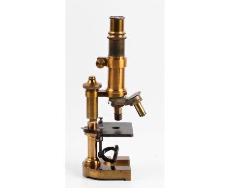 An E. Leitz Wetzlar No. 62023 brass microscope, inscribed Swift &amp; Son 1/6 in to the lens, height 28cm. IMPORTANT: Online 