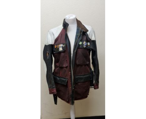A Belstaff motorbike jacket, with white leather to shoulders and Kings Norton patch and various badges. IMPORTANT: Online vie