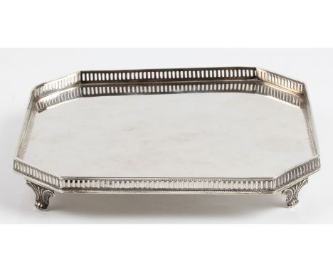 A silver card tray, of octagonal form with raised pierced edge on four feet, personal inscription to reverse, hallmarked Shef