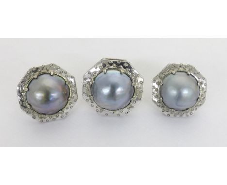 Pair of 18ct white gold and mabé pearl earrings and matching dress ring, each with single pearl in a white gold octagonal sur