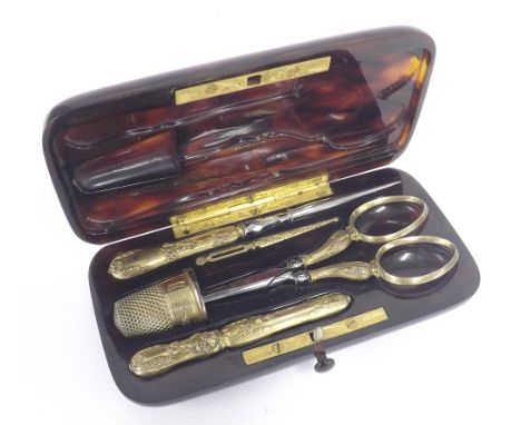 Good quality tortoiseshell etui, fitted with five silver-gilt sewing tools, the case 4.25" long