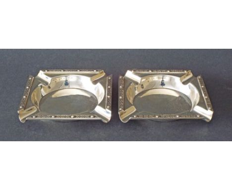 Pair of silver square ashtrays with Celtic type bands, maker Turner & Simpson, Birmingham 1963, 3.75" long, 5.5oz approx