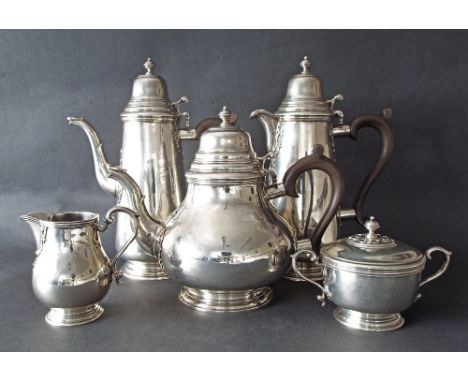 Five piece silver tea and coffee service in the Arts & Crafts manner, with Celtic type decoration, comprising teapot, coffee 