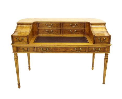 Good quality burr veneered Carlton House type desk, the raised back fitted with an arrangement of six small drawers over a gi