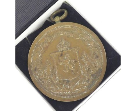Royal Caledonian Curling Club 1838-1888 large bronze medal, cast with a rampant lion crest and scene of people curling to the