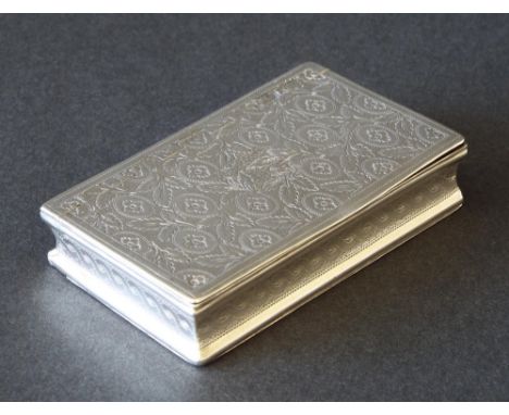 George III silver rectangular snuff box engraved with geometric flowerheads and leaves, the hinged lid enclosing a gilt inter