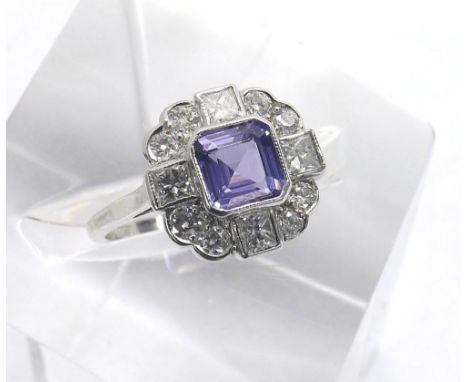 18ct white gold tanzanite and diamond cluster ring, asscher-cut tanzanite 0.85ct approx, in a surround of princess and round 