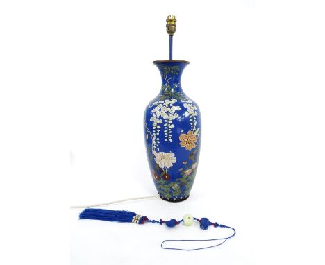 Japanese cloisonne baluster vase converted into a table lamp decorated with various wild flowers, 23" high; together with a f