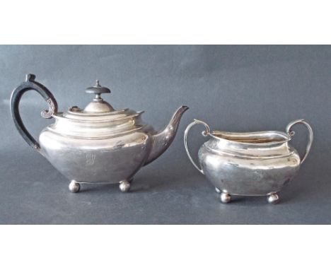 Silver bachelor boat shaped teapot and sucrier, maker James Dixon & Sons, date marks worn, the teapot 5" high, 8" long, 12.5o