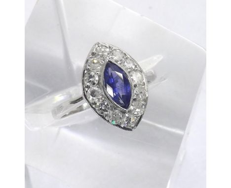 18ct white gold marquise shape sapphire and diamond cluster ring, sapphire centre stone within a surround of round brilliant-