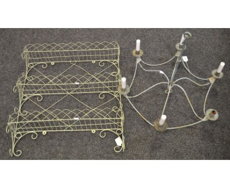 A wrought metal three section kitchen rack; a wrought metal six branch ceiling light (2)