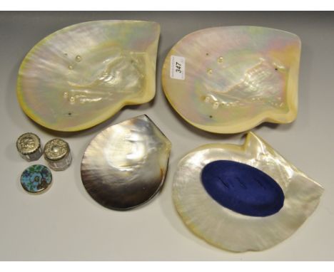 Four Victorian mother of pearl jewelers display stands; a bone hafted lady's fan, another possibly ebony; a Reynolds angel em