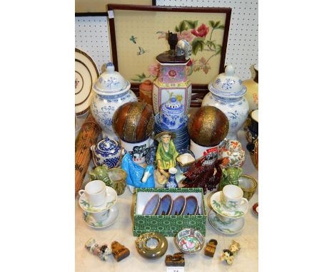 Oriental Objects - a mid 20th century Chinese embroidered tapestry on padouk wood stand; a pair of baluster shaped blue and w