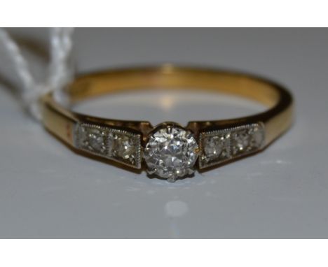 A diamond ring, set in platinum and 18ct gold