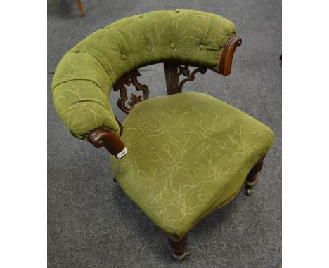 A Victorian mahogany tub chair, ceramic casters, c.1860