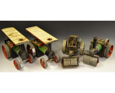 A Mamod TE1A traction engine; another; a Mamod steam roller; an Exserboats steam roller (4)