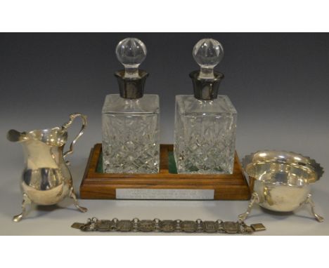 Silver - A Robinson &amp; Sons presentation decanter suite, silver collars; an Elizabeth II cream jug dated 1974, Birmingham 