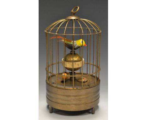 A reproduction automaton, birds in a bird cage.