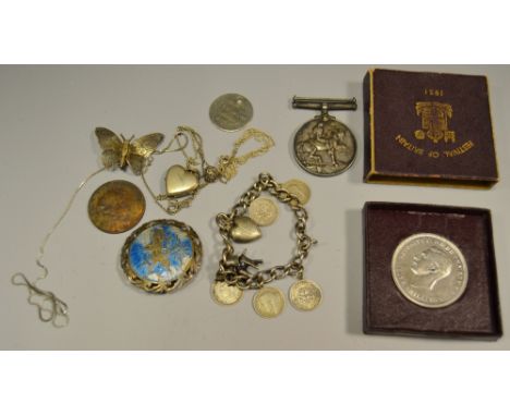 A 1914-1918 medal awarded to 63343 Pt. J.Clamp K.O.Y.L.I (King's Own Yorkshire Light Infantry); a silver charm bracelet with 