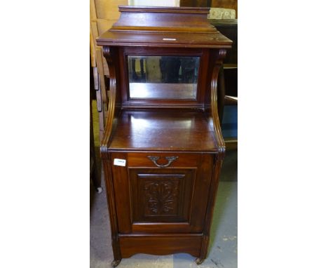 A late Victorian mahogany mirror-back coal purdonium