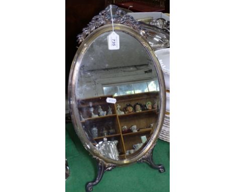An Edwardian silver plated oval dressing table mirror, with bow mount, H47cm