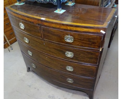 A Georgian mahogany bow-front chest of 2 short and 3 long drawers, on bracket feet, W113cm