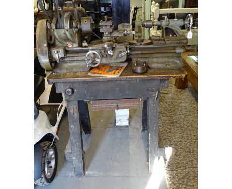 A Vintage Atlas (USA) bench-mounted lathe, overall length 1m