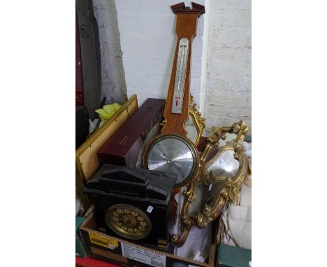 Gilt-framed mirrors, a barometer, pipes etc
