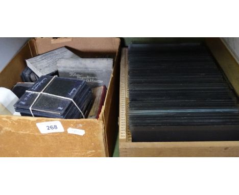 A boxful of glass negatives, lantern slides and gas light plates