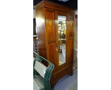 An Edwardian and marquetry decorated single mirror door wardrobe, W88cm