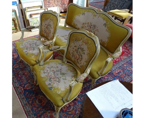 A Continental painted and needlework upholstered salon sofa, and pair of matching open armchairs