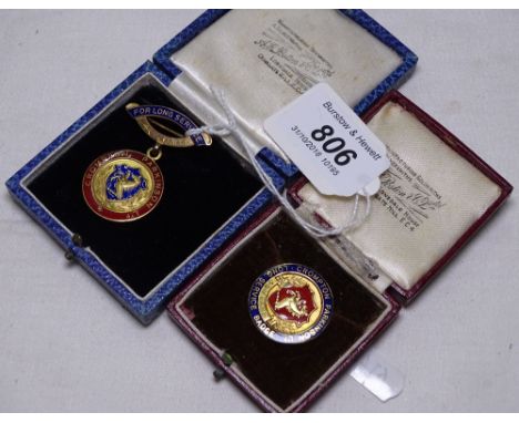 2 9ct gold and enamel badges, for Long Service at Crompton Parkinson Ltd, 23.3g