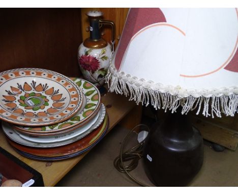 A large table lamp and shade, a Doulton jug, a bread plate etc