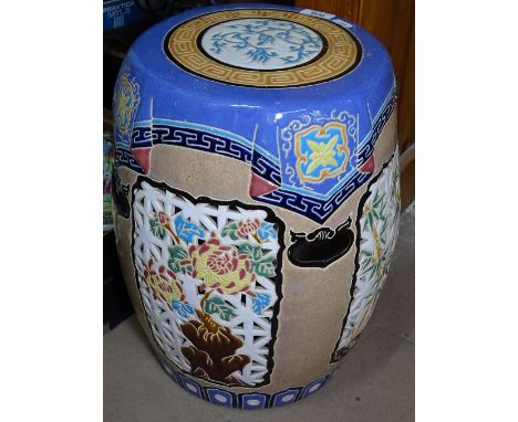 A ceramic Oriental barrel garden seat