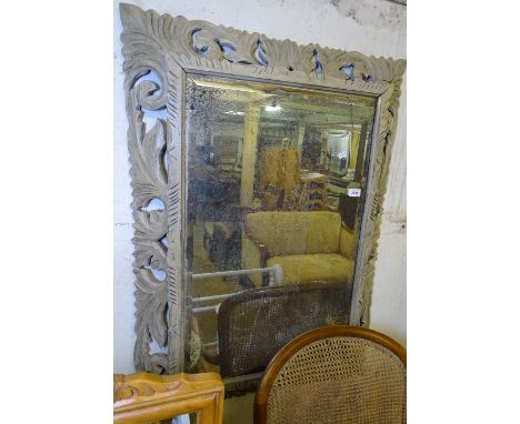 A French painted and carved framed wall mirror